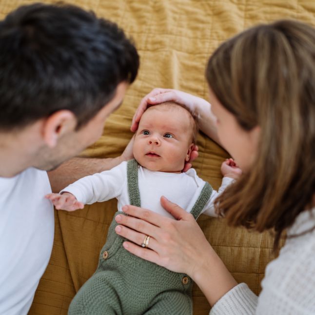 Parents staring at their child